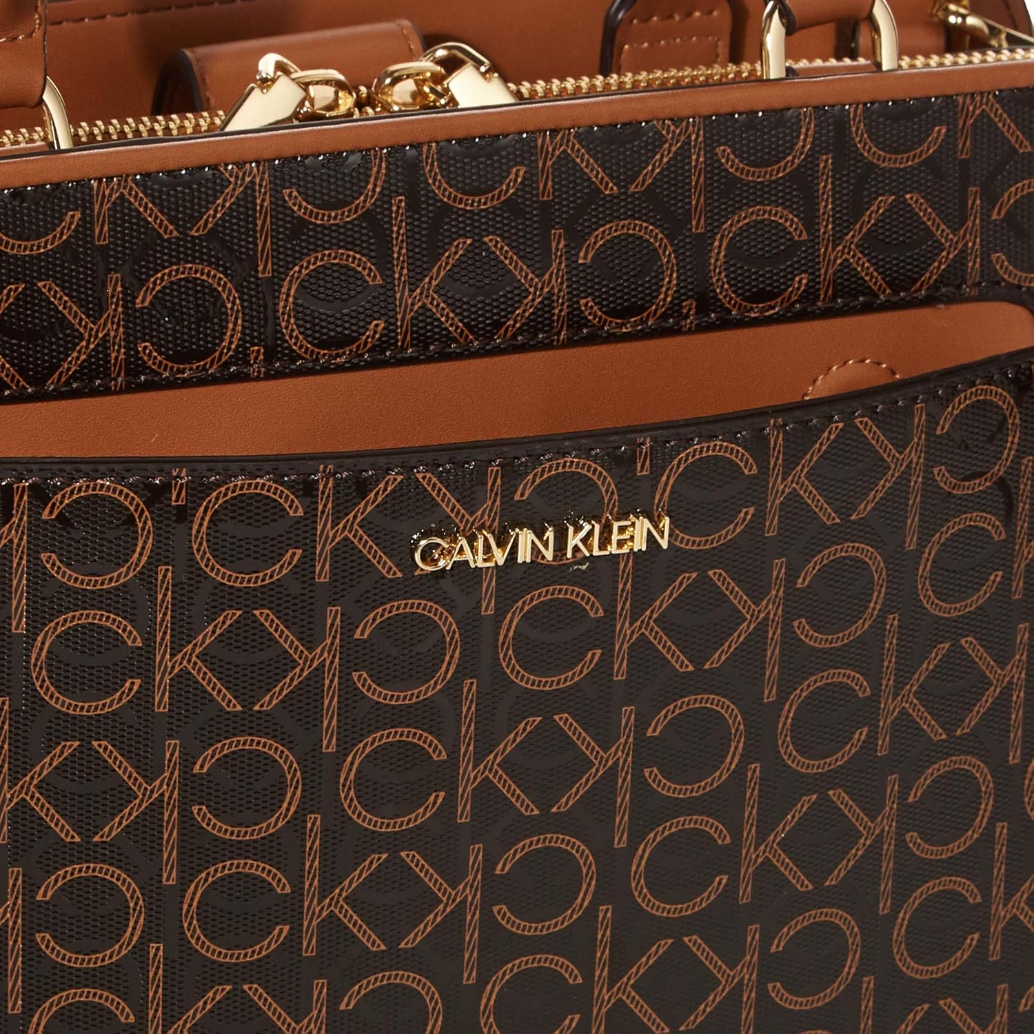 Calvin Klein textured satchel bag with signature logo pattern and spacious interior for stylish storage