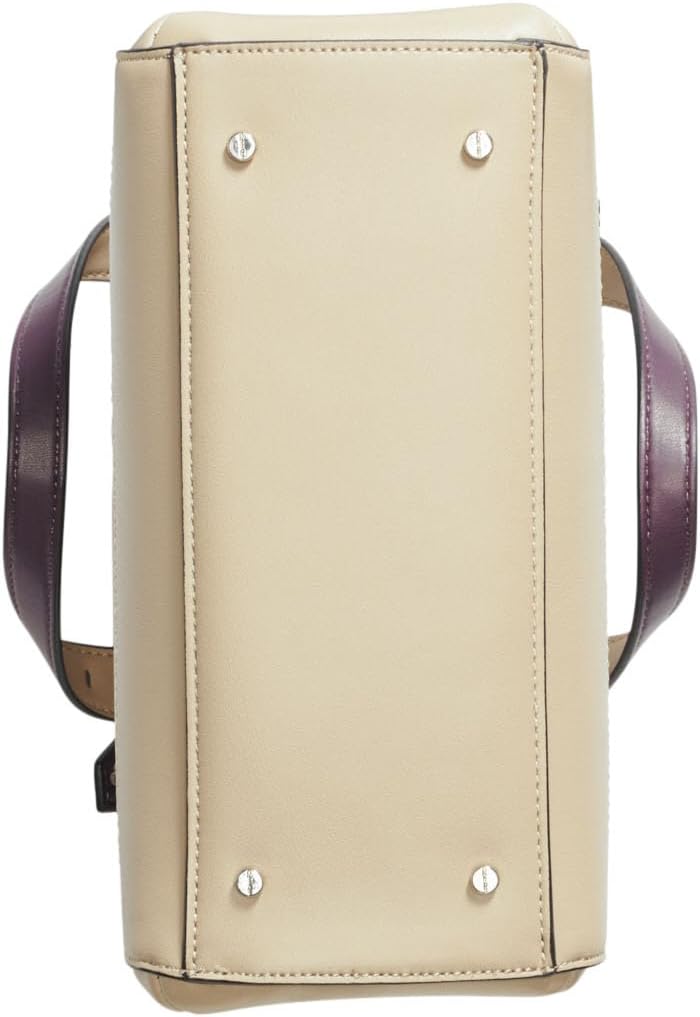 Bottom view of Calvin Klein triple compartment crossbody bag in beige with protective feet