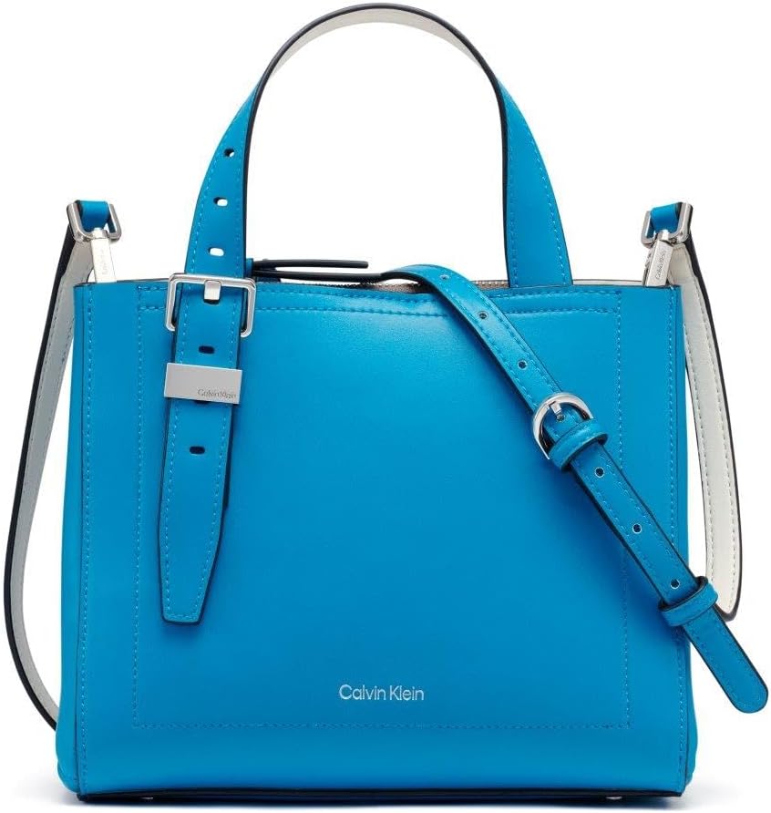 Calvin Klein triple compartment crossbody bag in vibrant blue with adjustable straps and stylish design