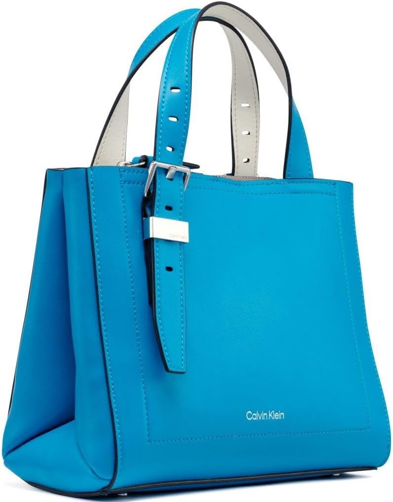 Calvin Klein triple compartment crossbody bag in vibrant blue with sleek design and adjustable strap