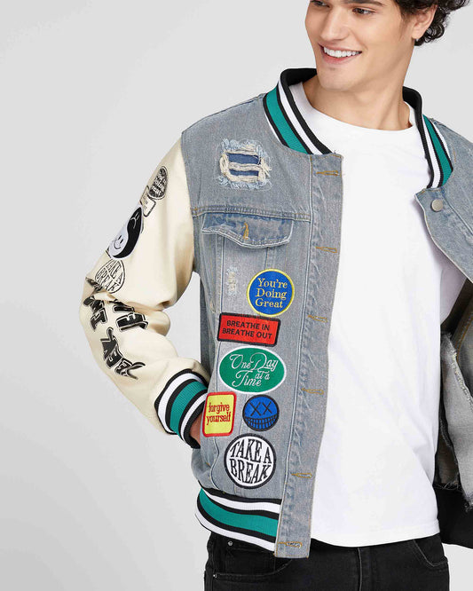 Logeqi cartoon denim baseball jacket featuring colorful patches and a stylish design for casual wear