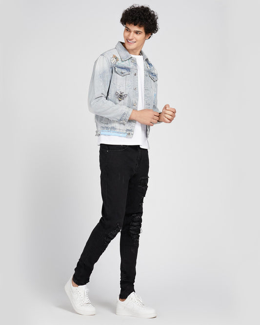 Logeqi casual denim jacket for men in light wash with distressed details and a trendy fit