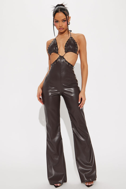 Fashion Nova chocolate faux leather jumpsuit with cut-out details and flared legs, perfect for stylish evenings