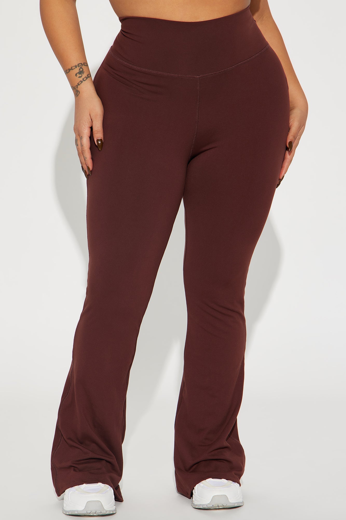 Fashion Nova chocolate yoga pants for women in a stylish flared design for comfort and flexibility