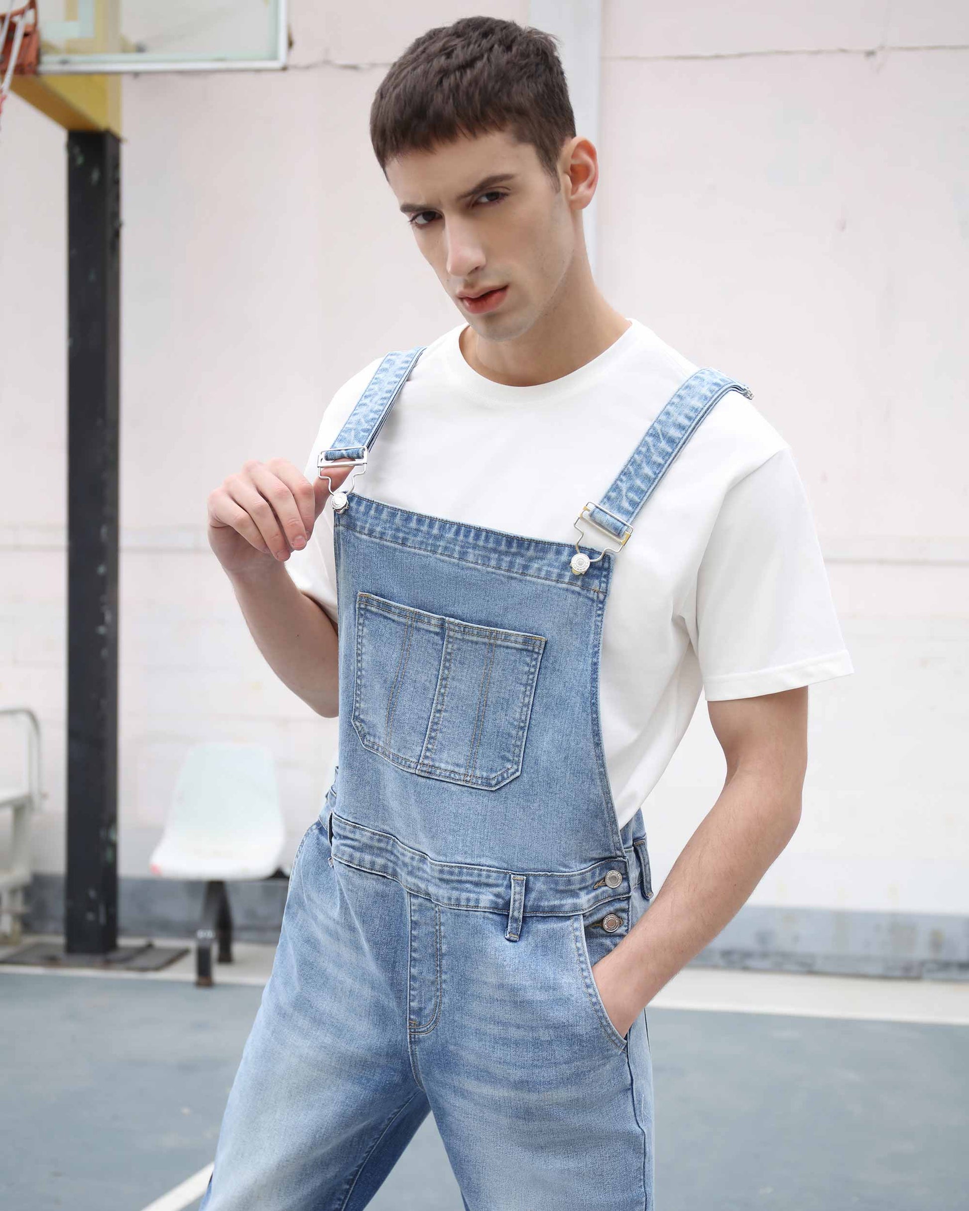 Logeqi classic denim overalls worn by man with white t-shirt in casual indoor setting