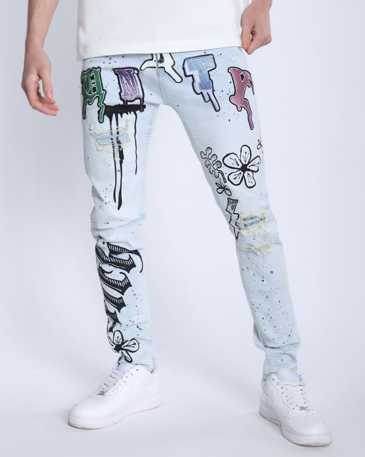 Logeqi comic painted ripped jeans in light blue with colorful graffiti art and distressed details