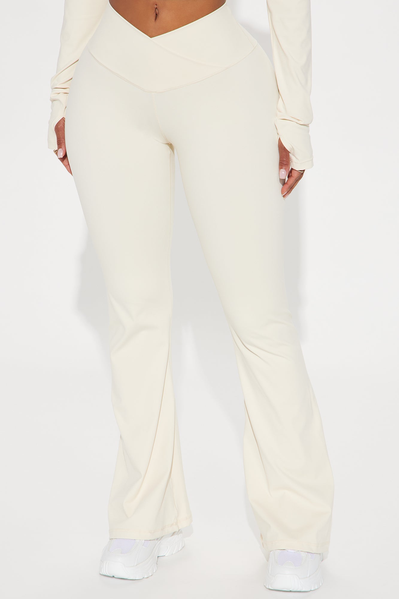 Cream active leggings for women with a high waist design for a flattering fit