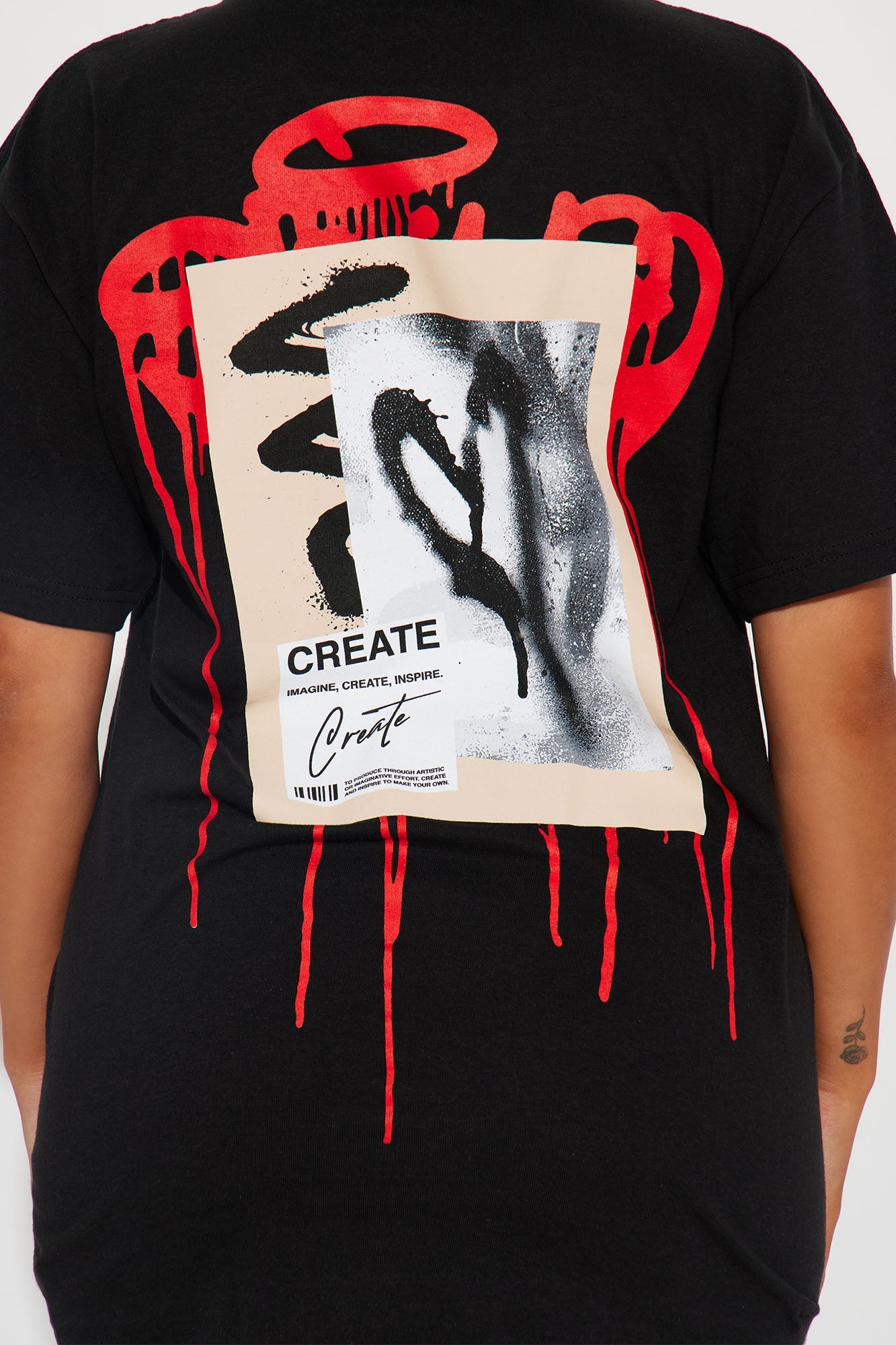 Create what you love graphic tee in black with bold red art and artistic design on the back