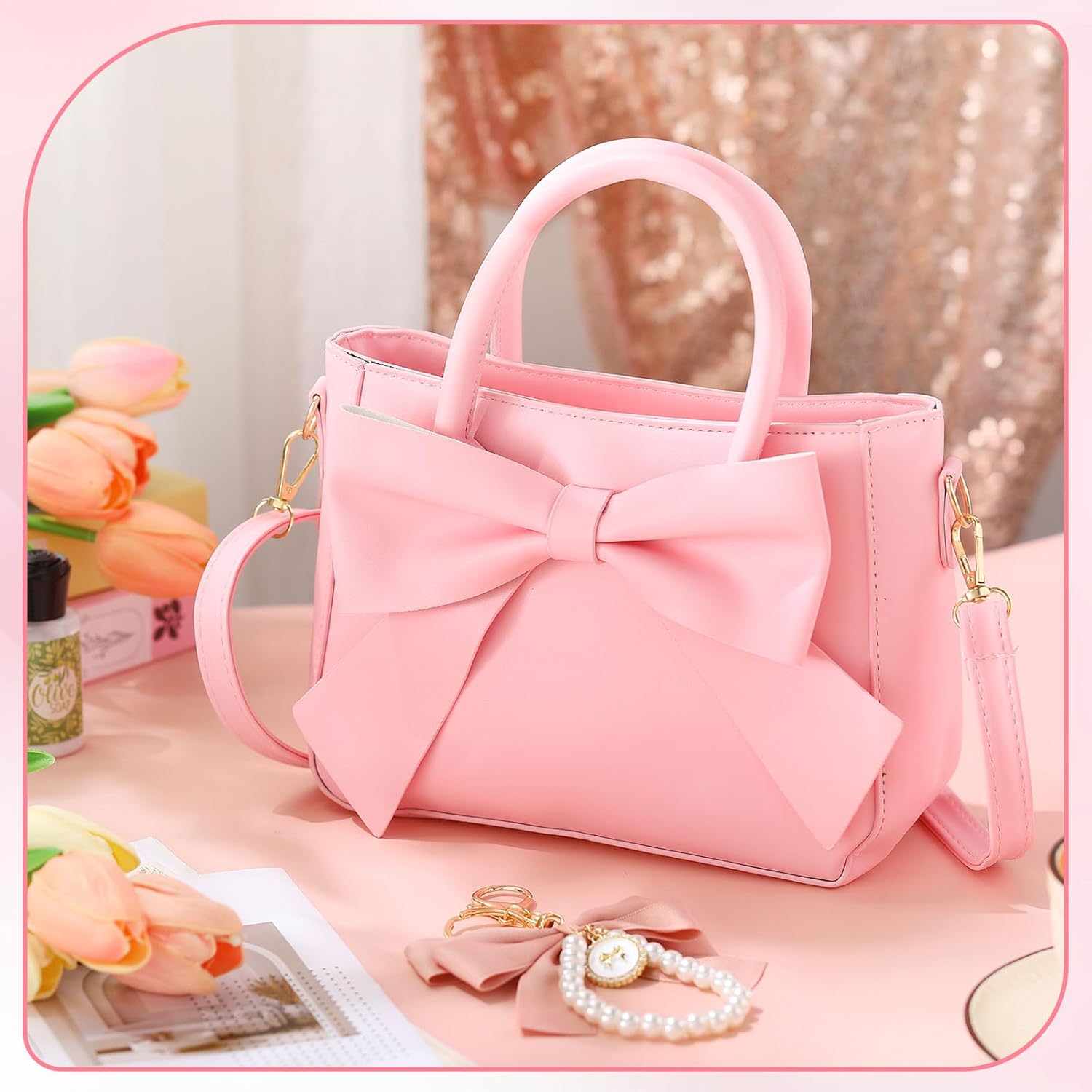 Pink crossbody bag with large bow accessory by Modan Online cute purses for women