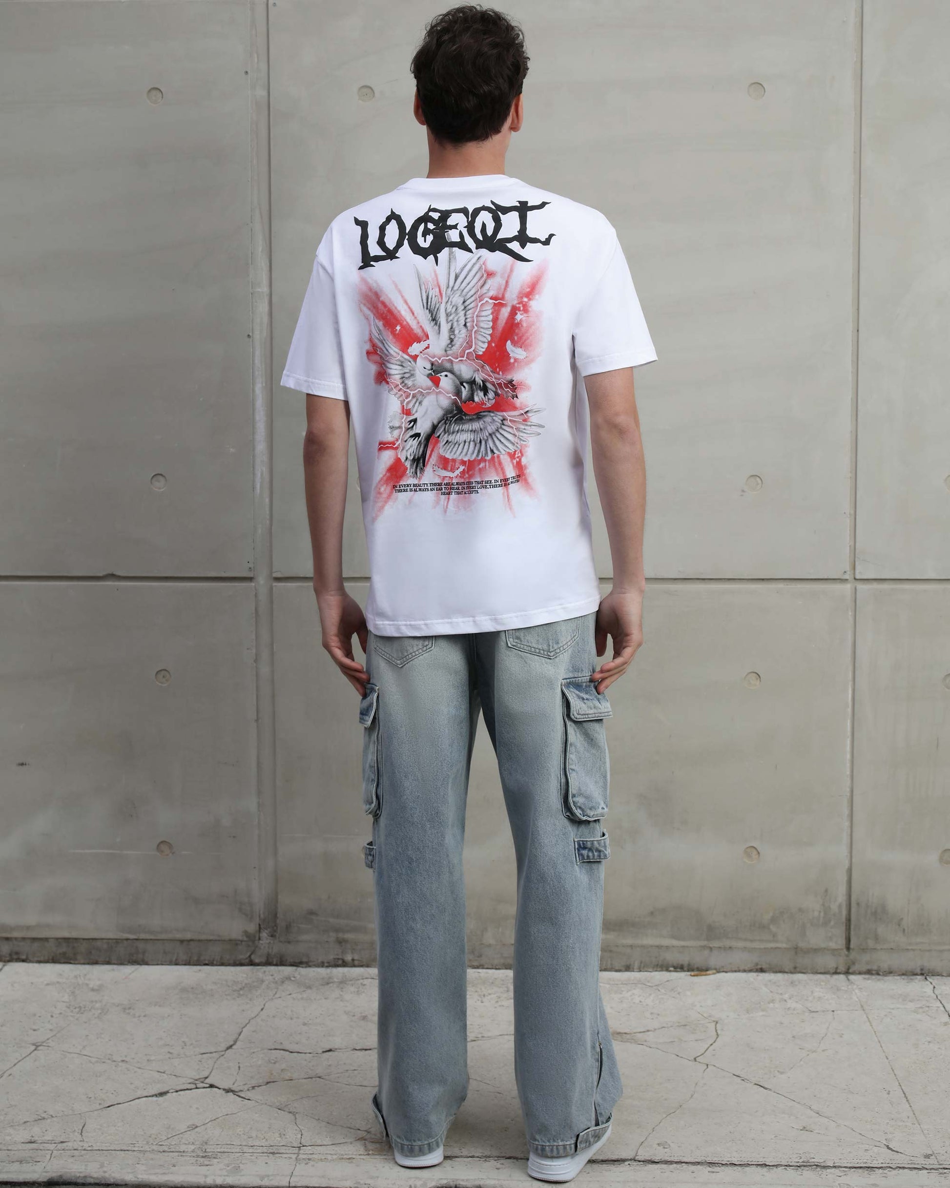 Man wearing Logeqi distressed blue baggy jeans with cargo pockets and relaxed fit from the back