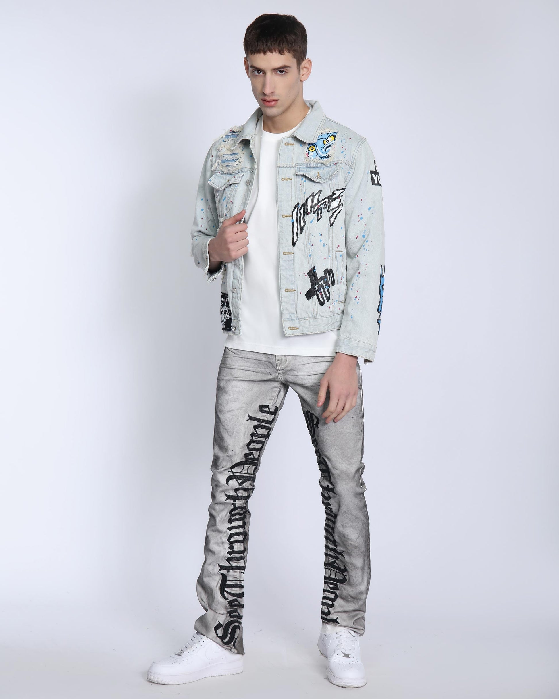 Logeqi distressed blue denim jacket featuring unique graphics and a modern fit