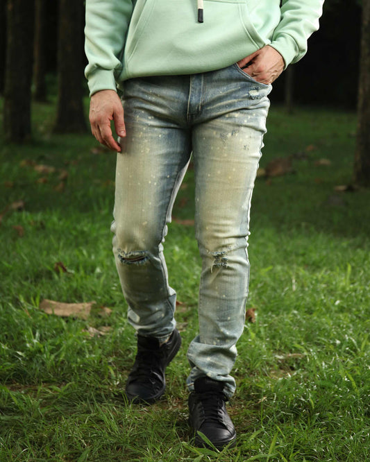 Logeqi distressed blue jeans featuring a relaxed fit and stylish ripped details for casual wear
