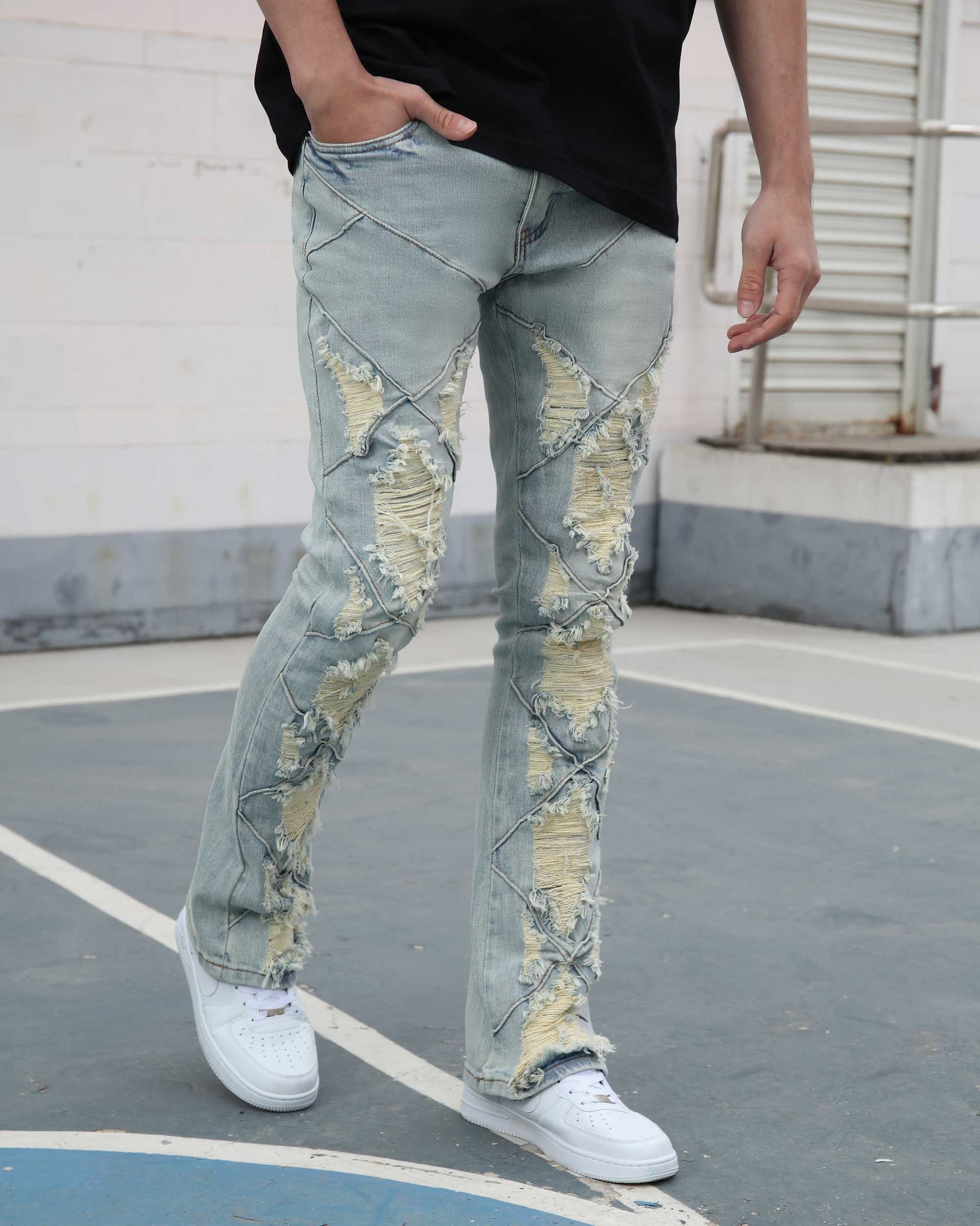 Logeqi distressed blue jeans featuring unique rips and a trendy fit for a casual look