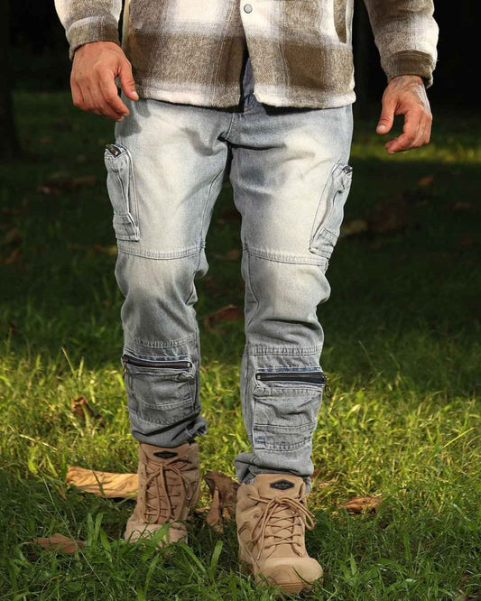 Logeqi distressed cargo jeans in light wash with multiple pockets worn with beige boots