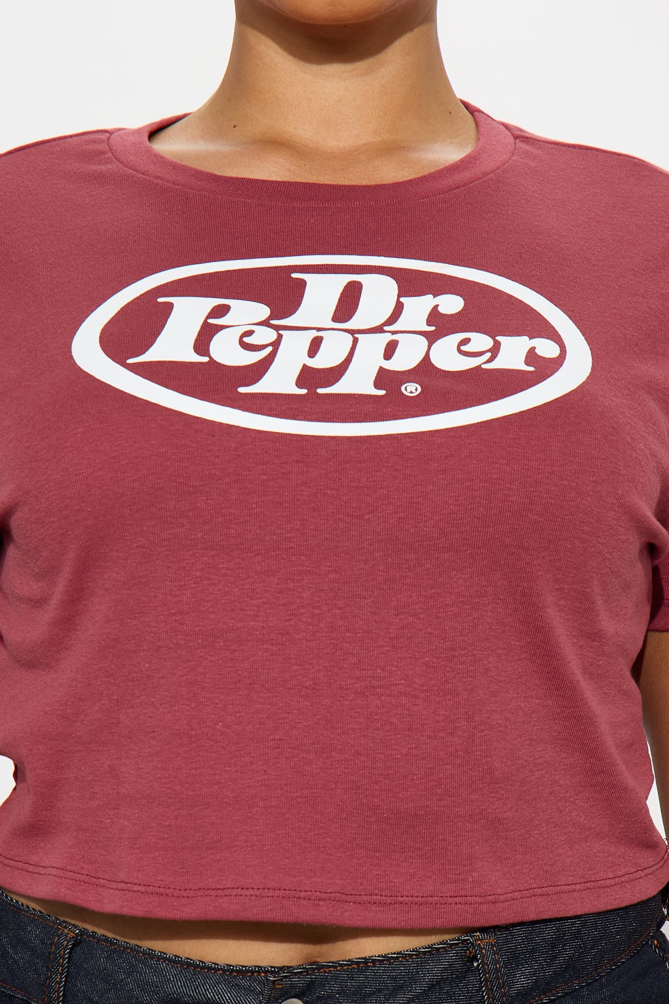 Fashion Nova Dr Pepper baby tee in maroon with a bold white logo on a cropped design