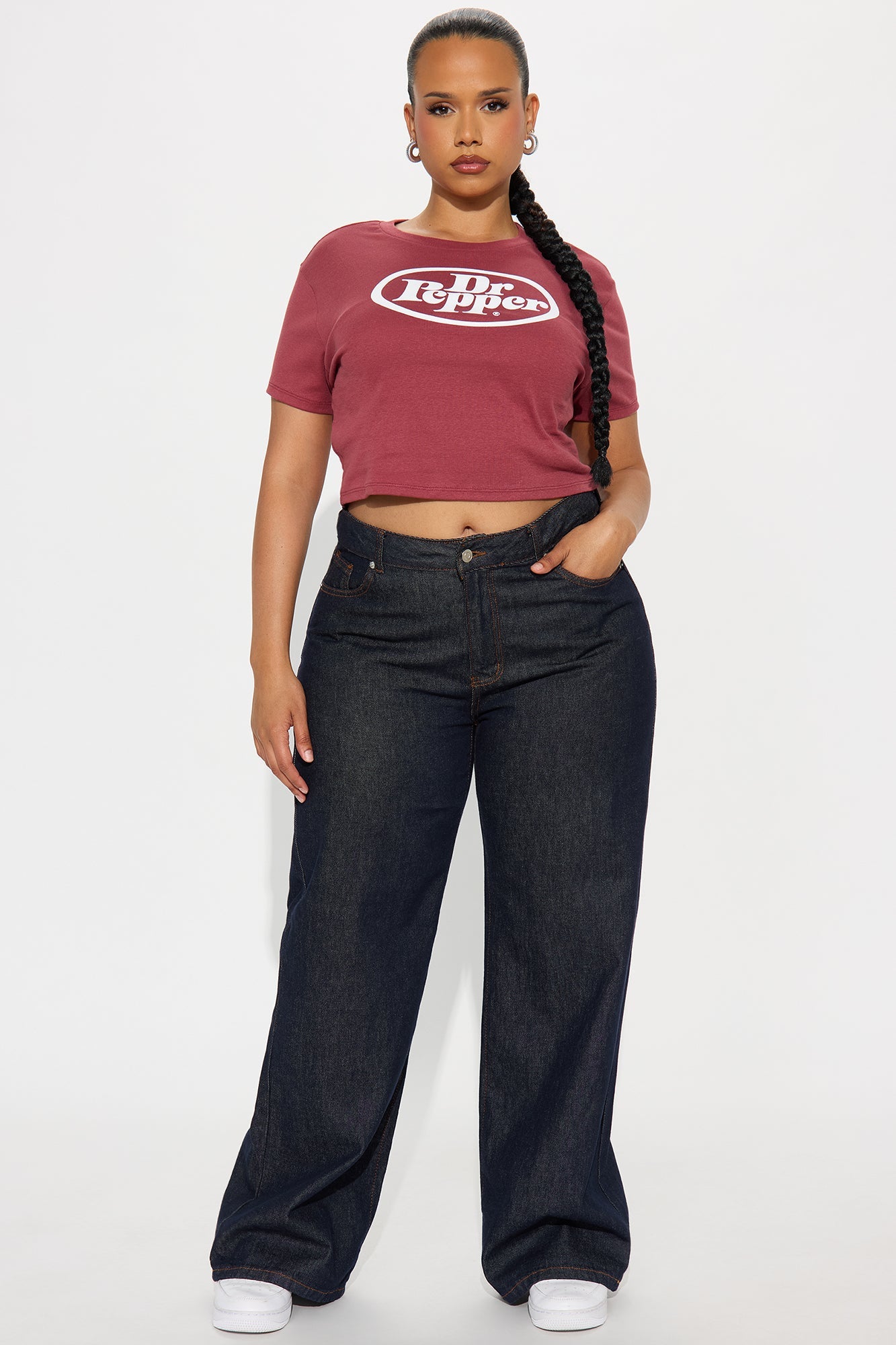 Fashion Nova Dr Pepper baby tee paired with high-waisted dark denim jeans for a casual look