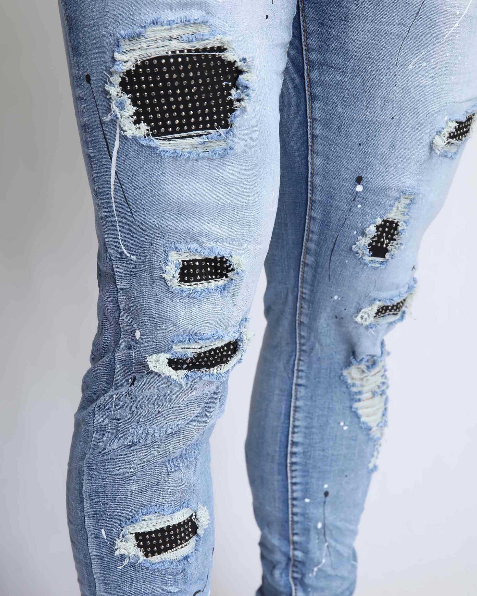 Logeqi durable ripped jeans online featuring stylish distressing and unique detailing