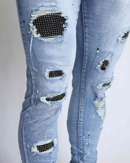 Logeqi durable ripped jeans online featuring stylish distressing and unique detailing