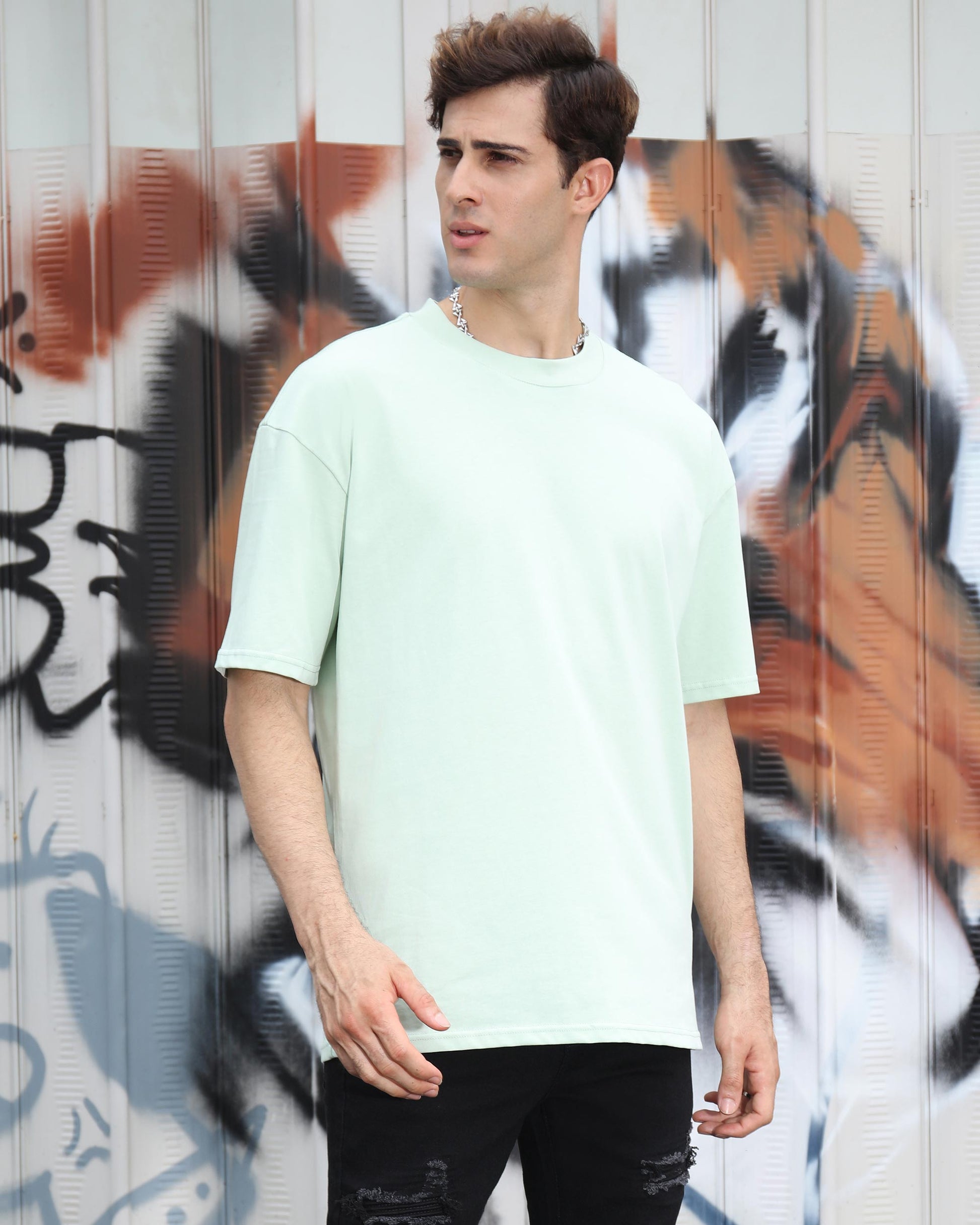 Logeqi Oversize T-Shirt in Mint Green, a stylish essential cotton tee for casual wear.