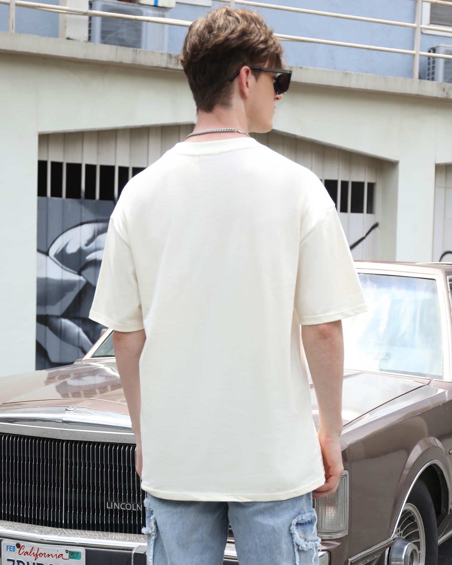 Logeqi Essential Solid T-Shirt in cream color, oversized fit, perfect for casual style
