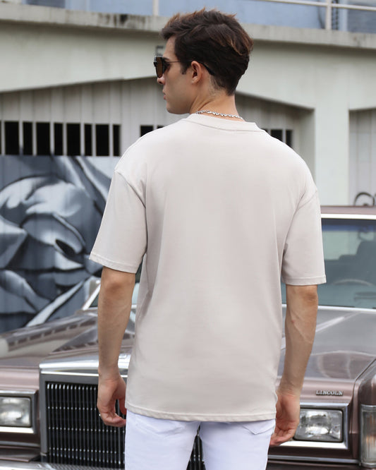 Logeqi essential solid t-shirt in beige, showcasing an oversize fit and stylish design