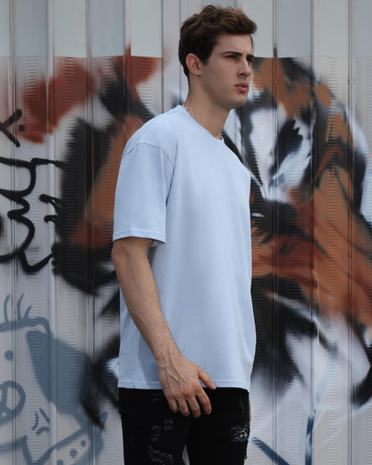 Logeqi essential solid t-shirt in light blue, featuring a comfortable oversized fit for casual wear
