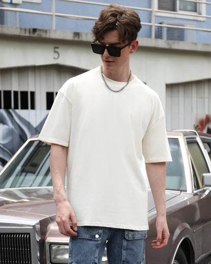 Logeqi essential solid t-shirt in beige, featuring an oversized fit and relaxed style for casual wear.