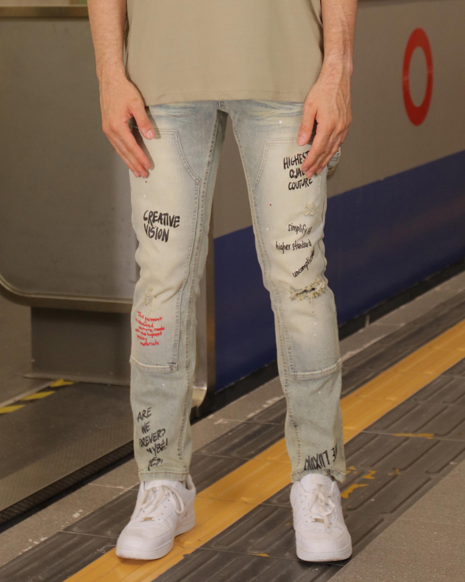 Logeqi essential solid tee worn with distressed jeans for a stylish urban look