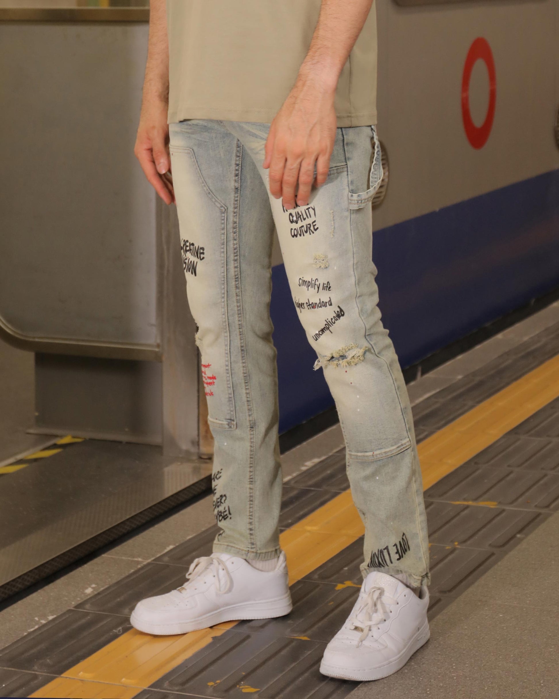 Logeqi essential solid tee paired with distressed jeans and white sneakers for a trendy casual look