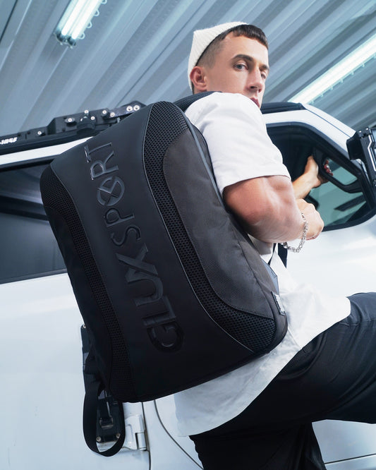 GLUX men's sports backpack in black worn by a model, perfect for active lifestyles