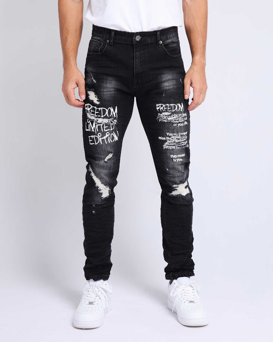 Logeqi Gothic graffiti jeans in black featuring distressed details and unique text designs