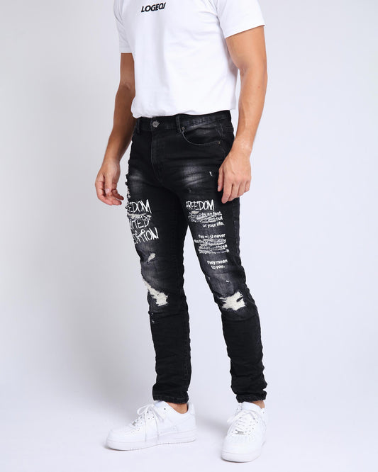 Logeqi Gothic graffiti jeans in black with distressed details and stylish text patterns