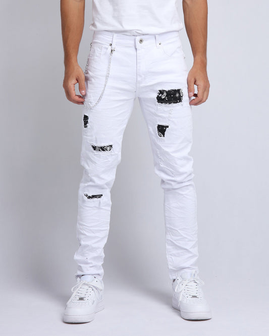 Logeqi graffiti patch slim fit jeans in white with distressed details for a trendy look