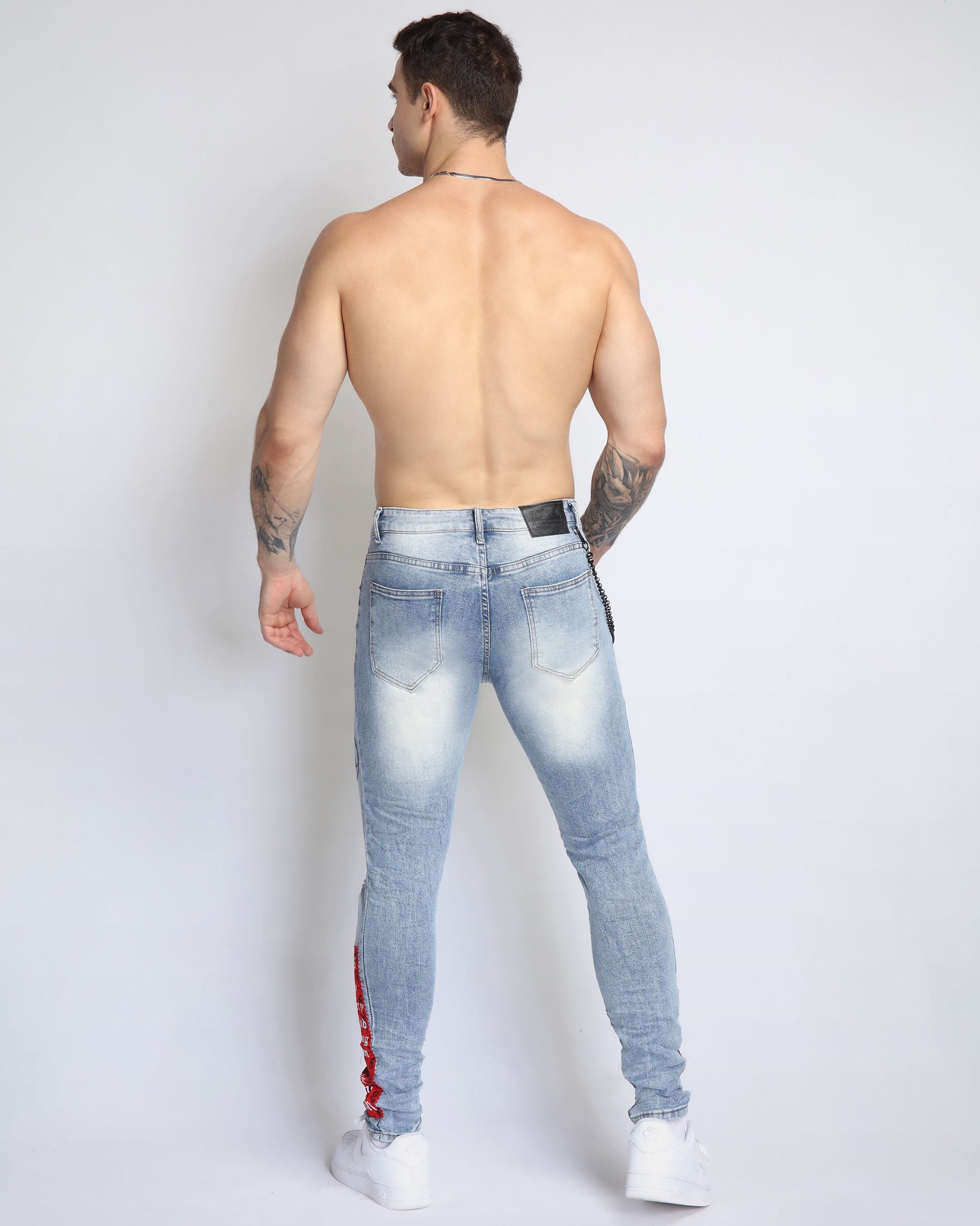 Logeqi graffiti ripped jeans for men featuring a stylish fit and unique distressed design