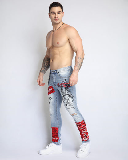 Logeqi graffiti ripped jeans in light wash with bold red and black designs for a stylish urban look