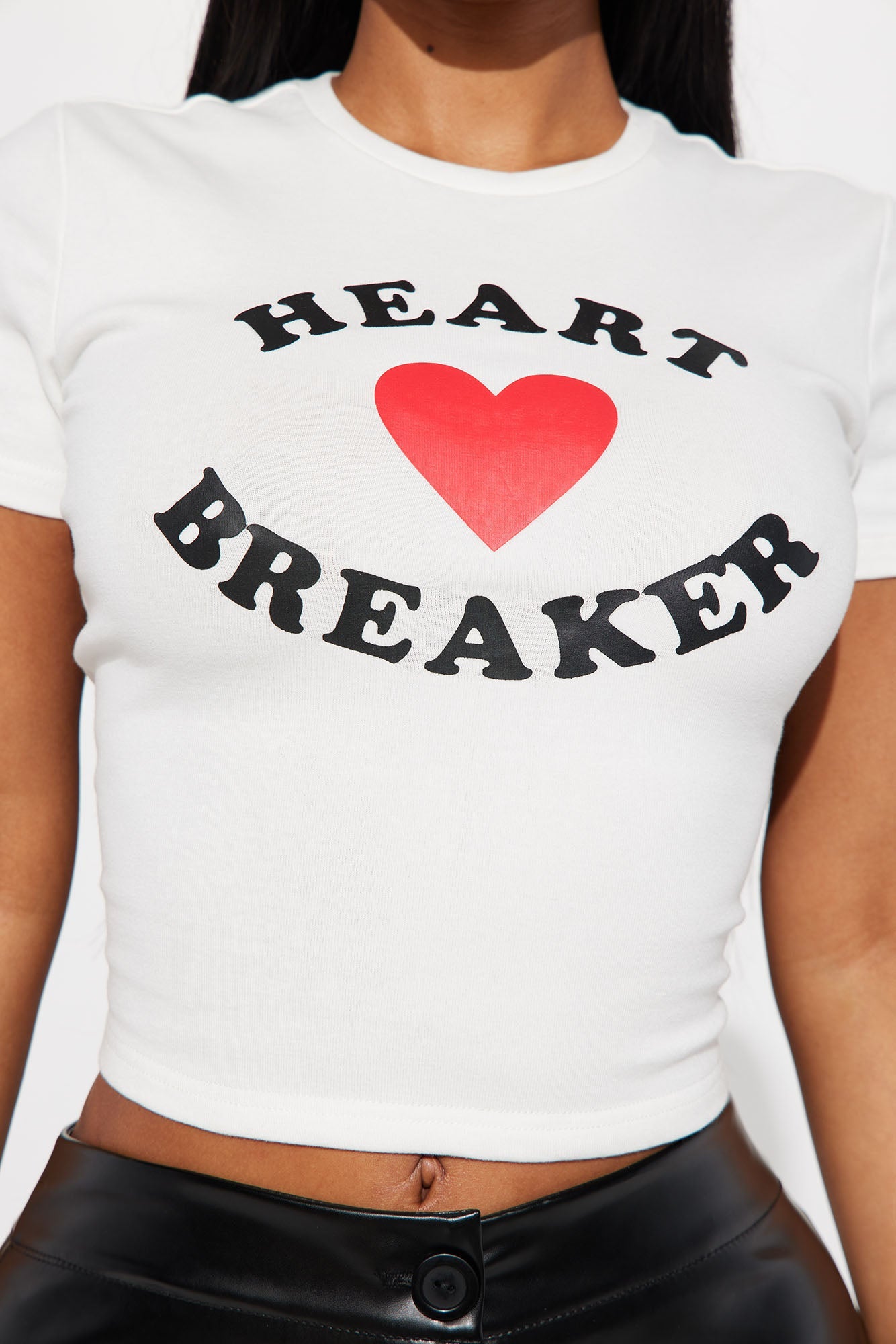 Fashion Nova I Love Breaking Hearts tee in white with bold heartbreaker graphic design