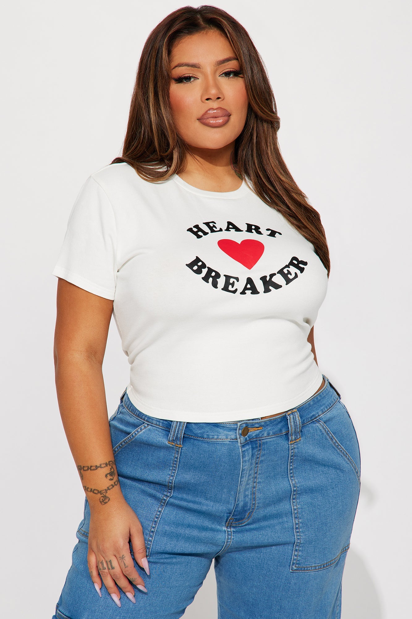 Fashion Nova I Love Breaking Hearts tee in white with a heartbreaker graphic for a trendy casual look