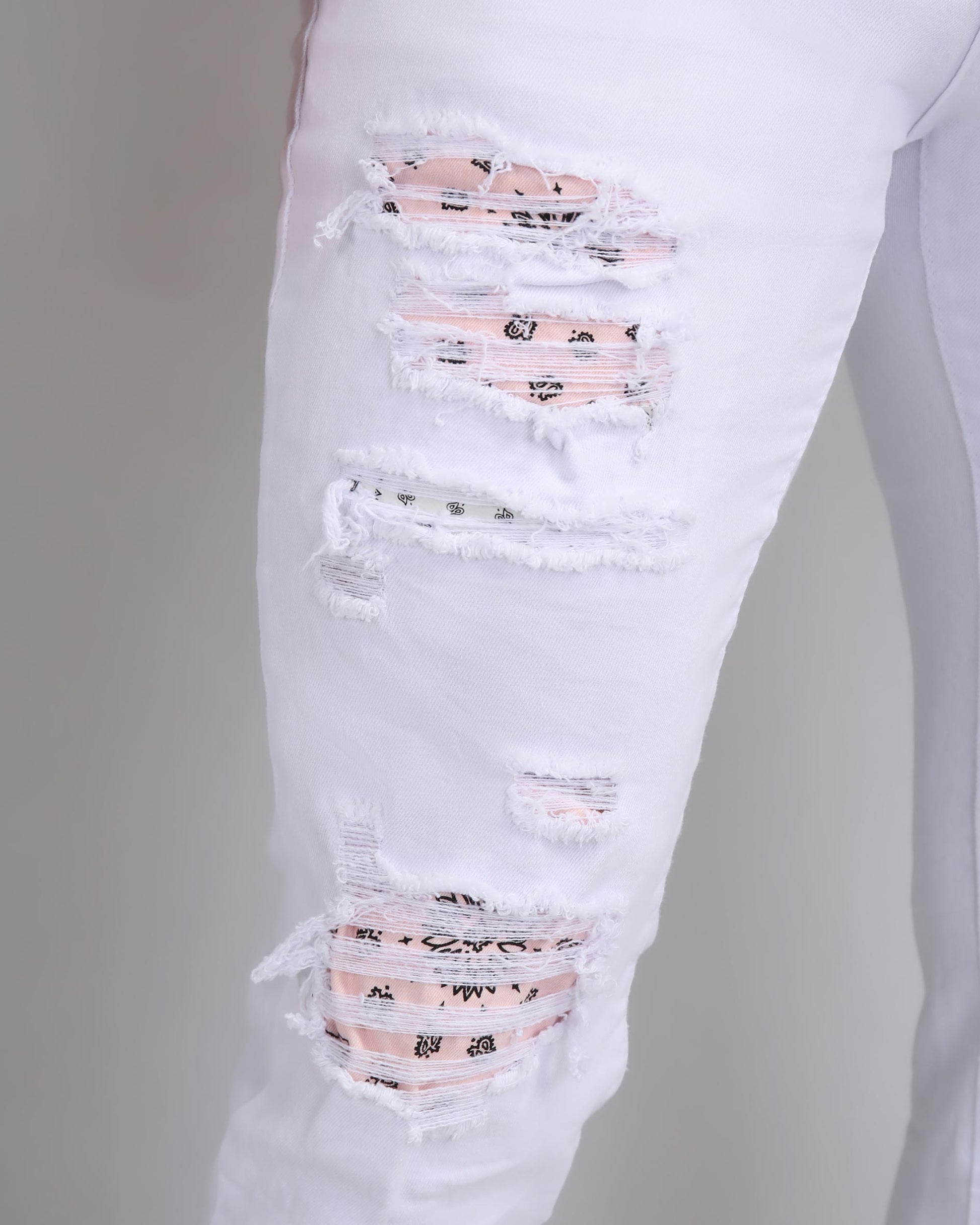 Logeqi irregular ripped white jeans featuring stylish distressed details and a comfortable fit