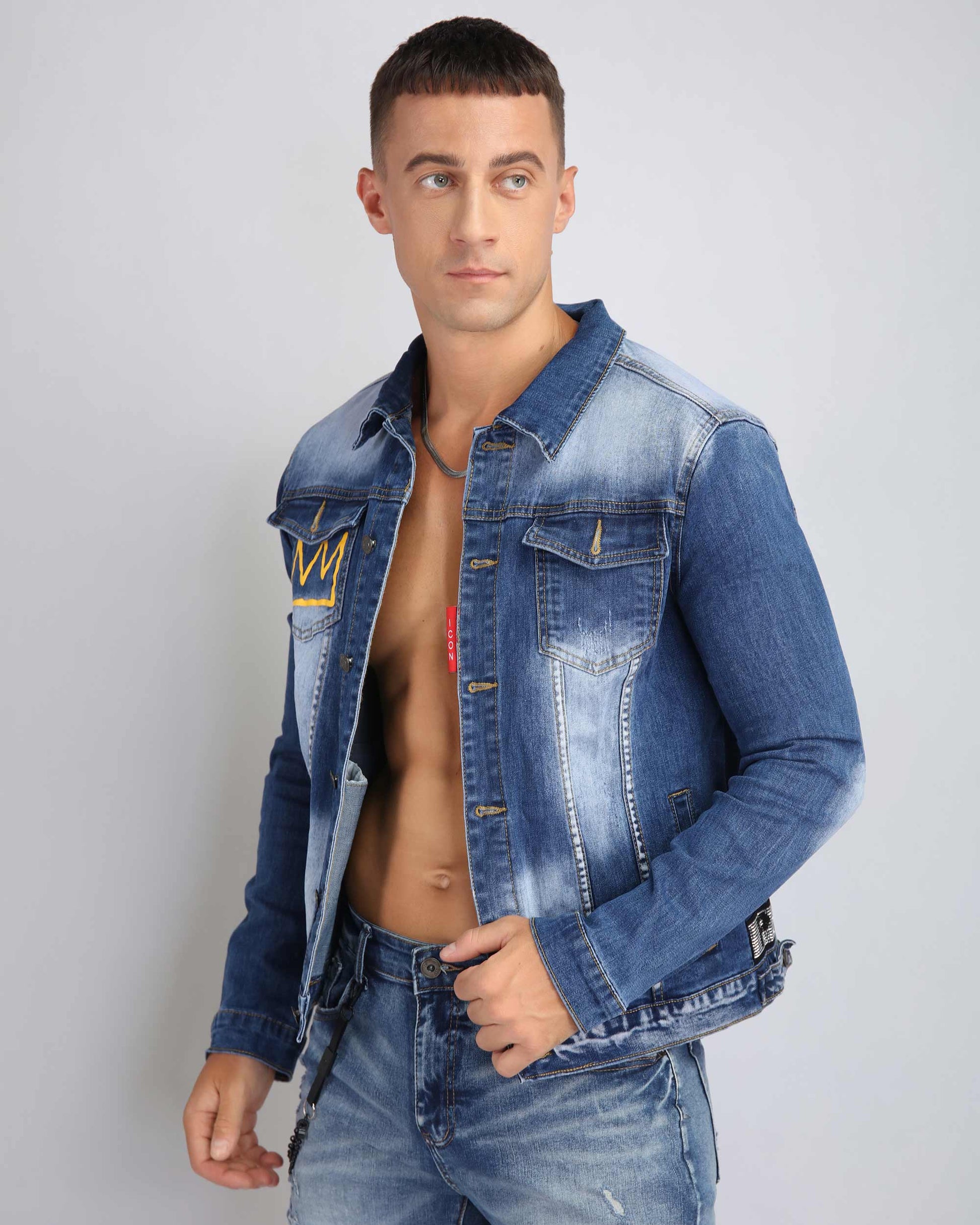 Logeqi irregular wash blue denim jacket stylishly worn by a model with a modern fit
