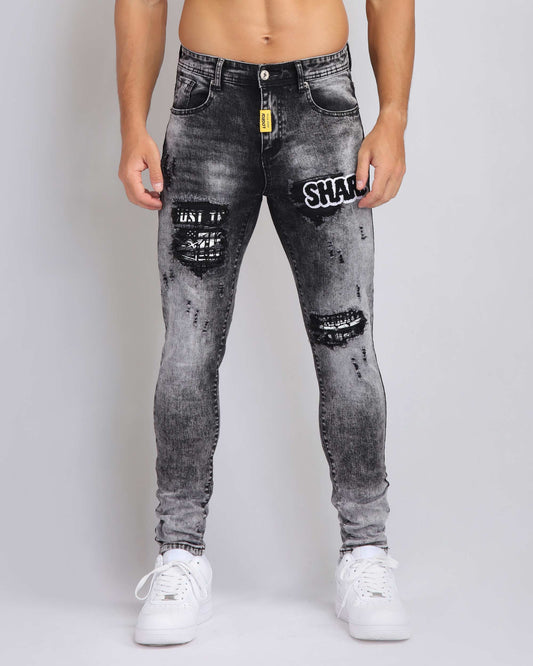 Logeqi Irregular Wash Ripped Jeans with distressed details and slim fit design for a trendy look