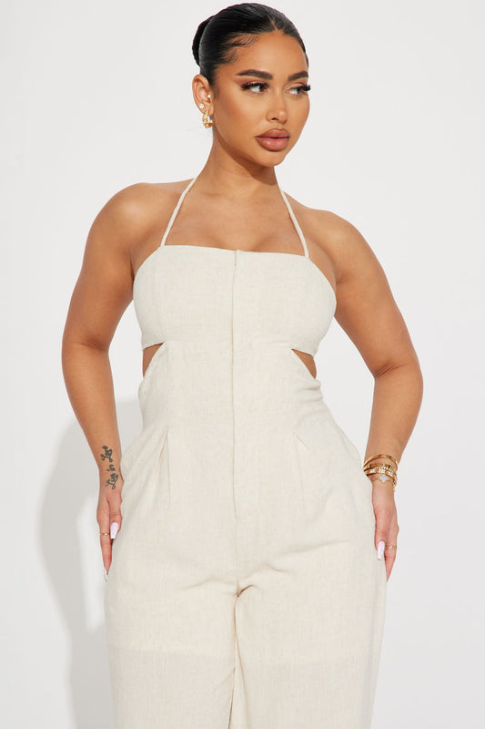 Fashion Nova Ivory jumpsuit for women with halter neck and cutout design for a trendy look