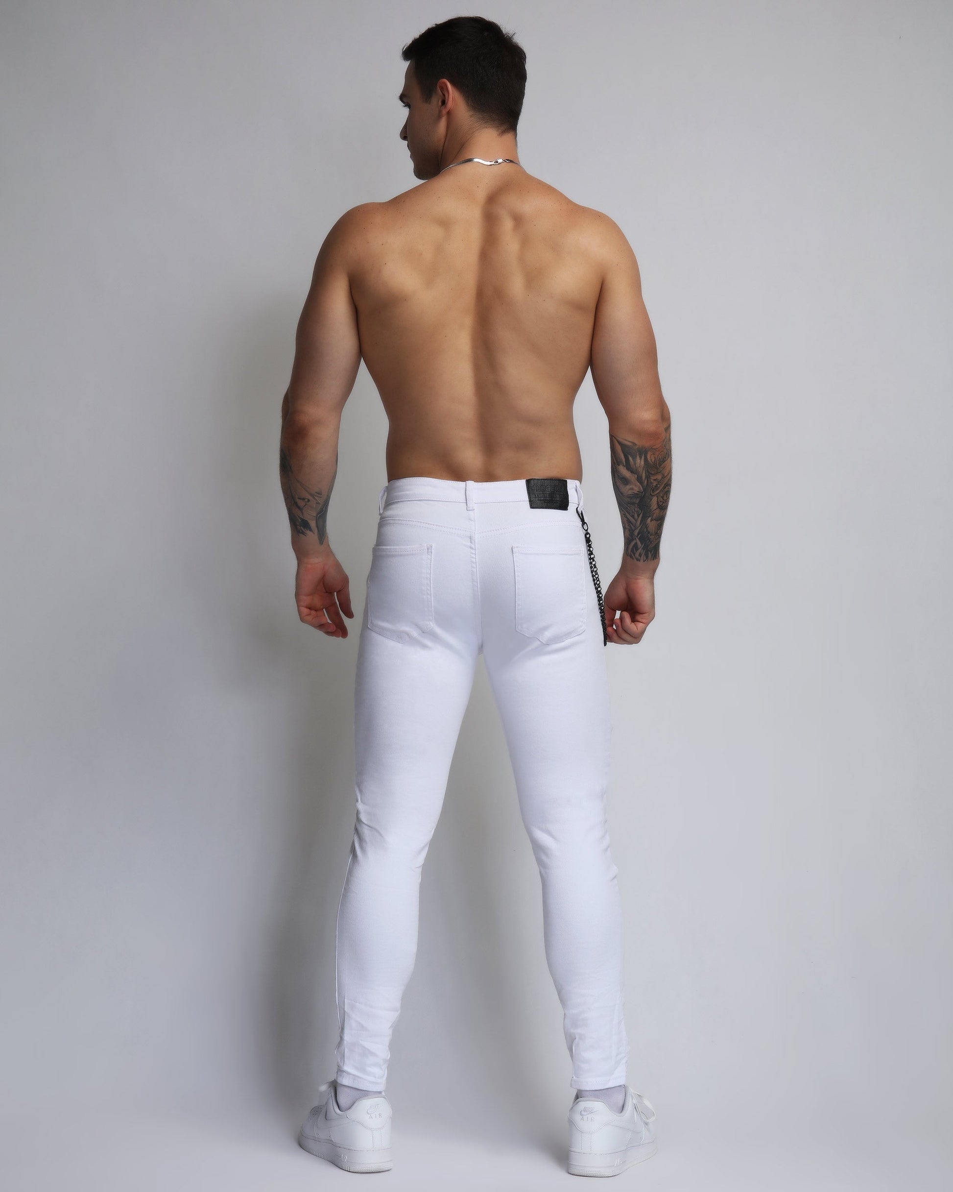 Logeqi large white ripped jeans with a slim fit and stylish design for casual wear