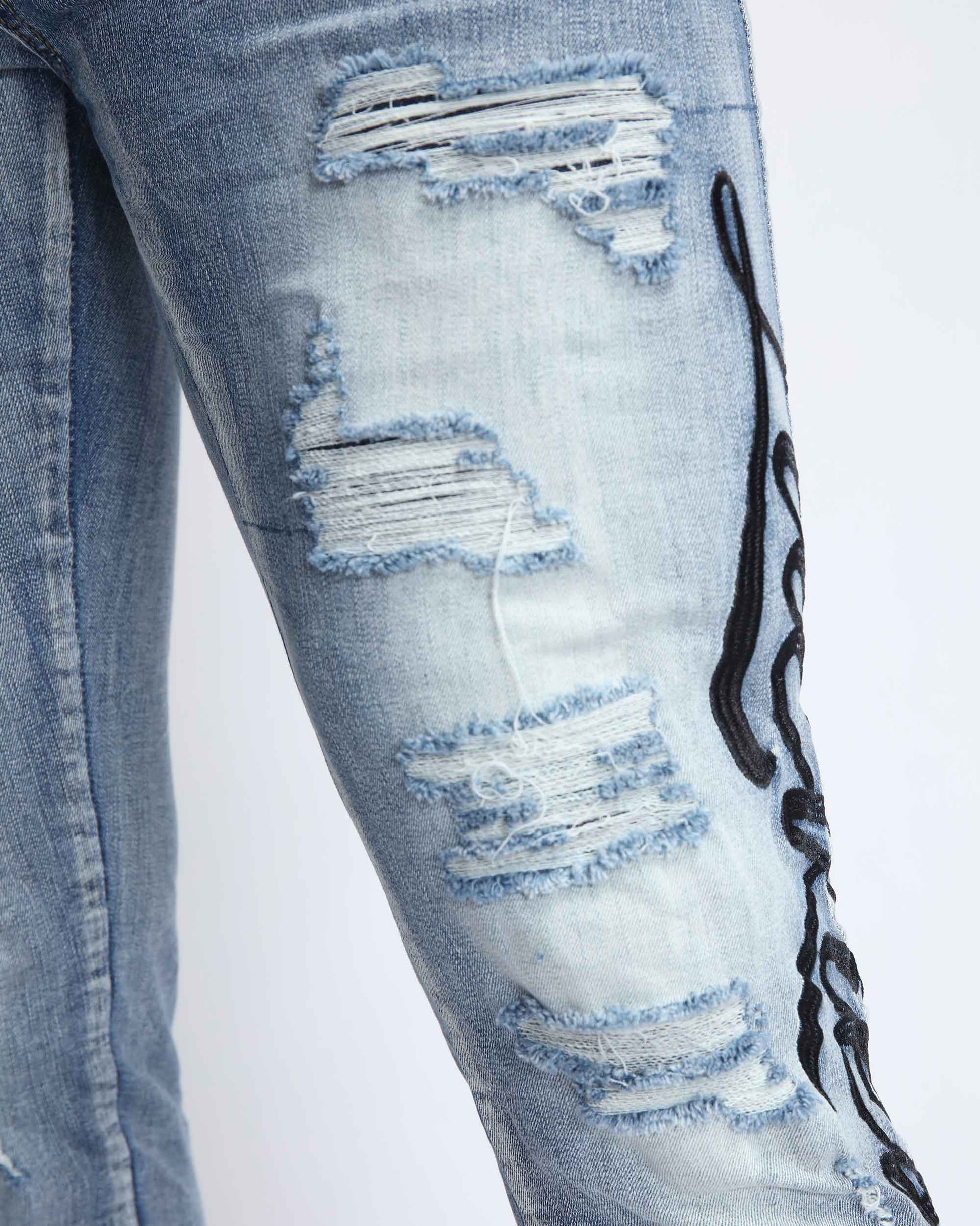 Logeqi light wash blue ripped jeans with distressed details and stylish design