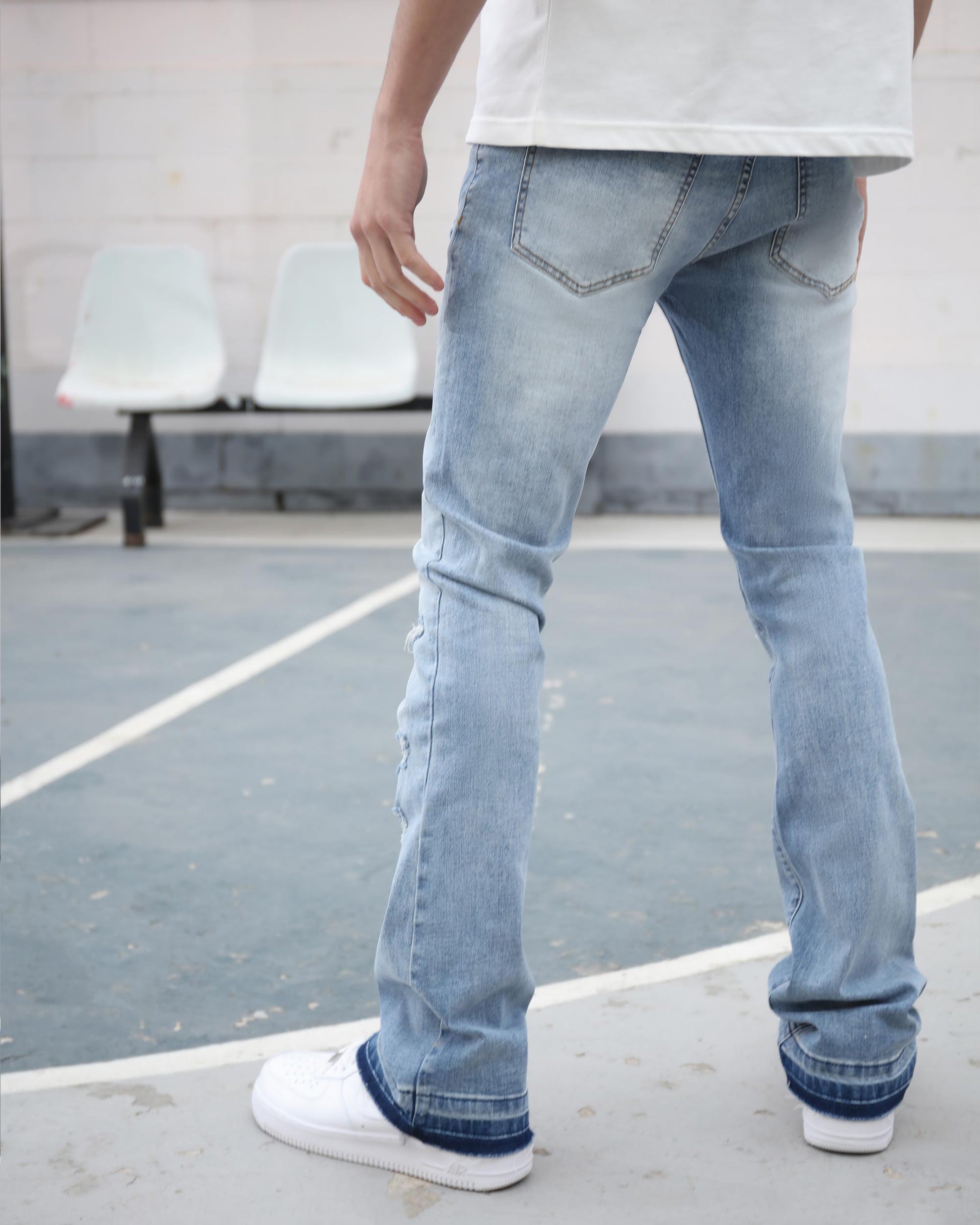 Logeqi light wash ripped jeans shown from the back, ideal for casual wear