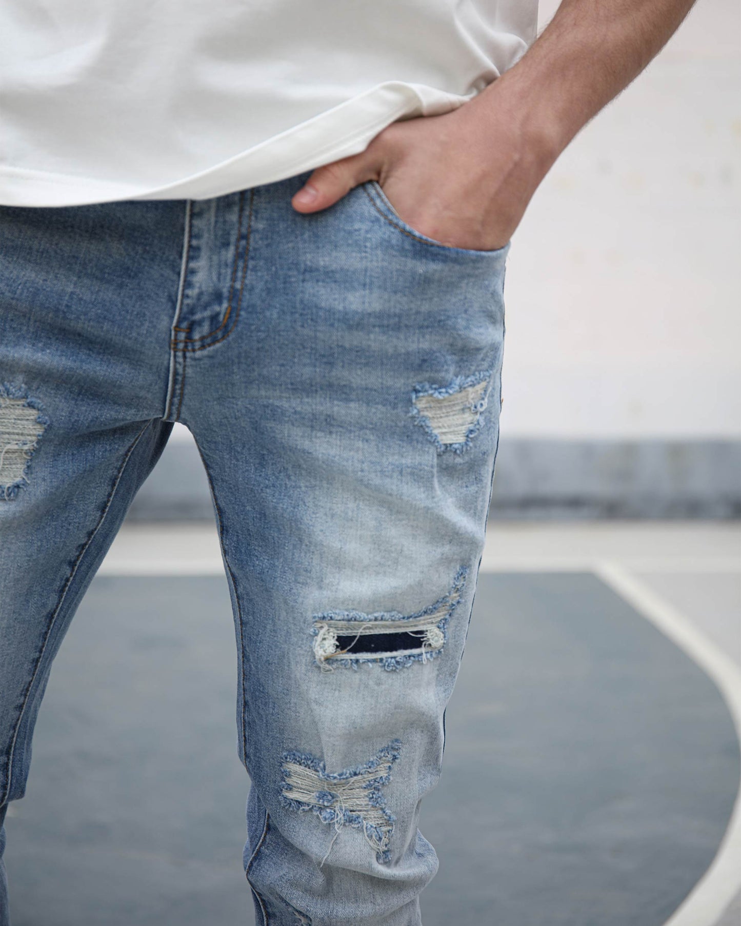 Logeqi light wash ripped jeans featuring stylish distressed details for a trendy casual look