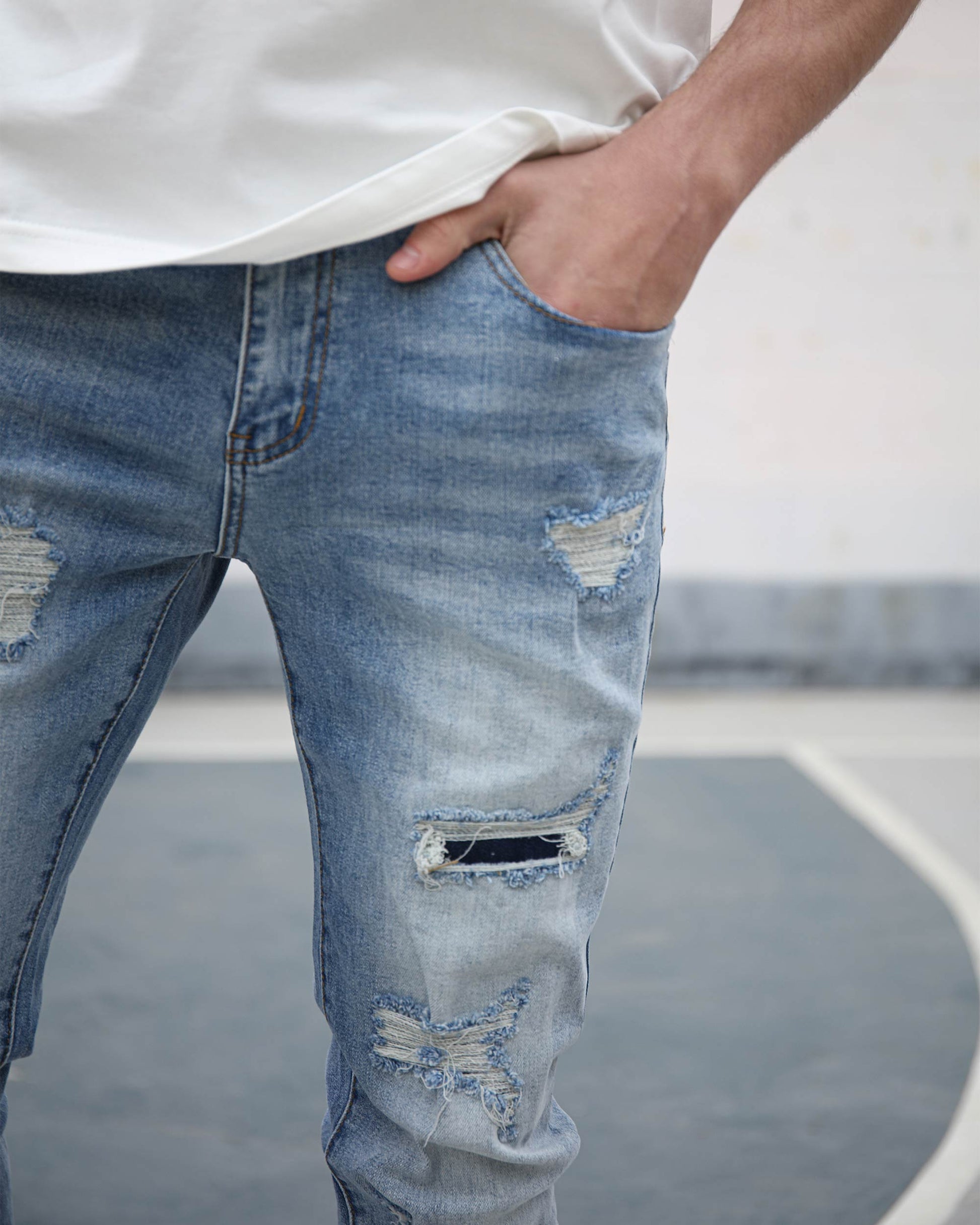 Logeqi light wash ripped jeans featuring stylish distressed details for a trendy casual look