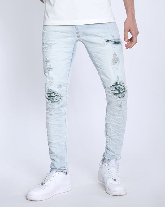Logeqi light wash ripped jeans featuring distressed details and a slim fit