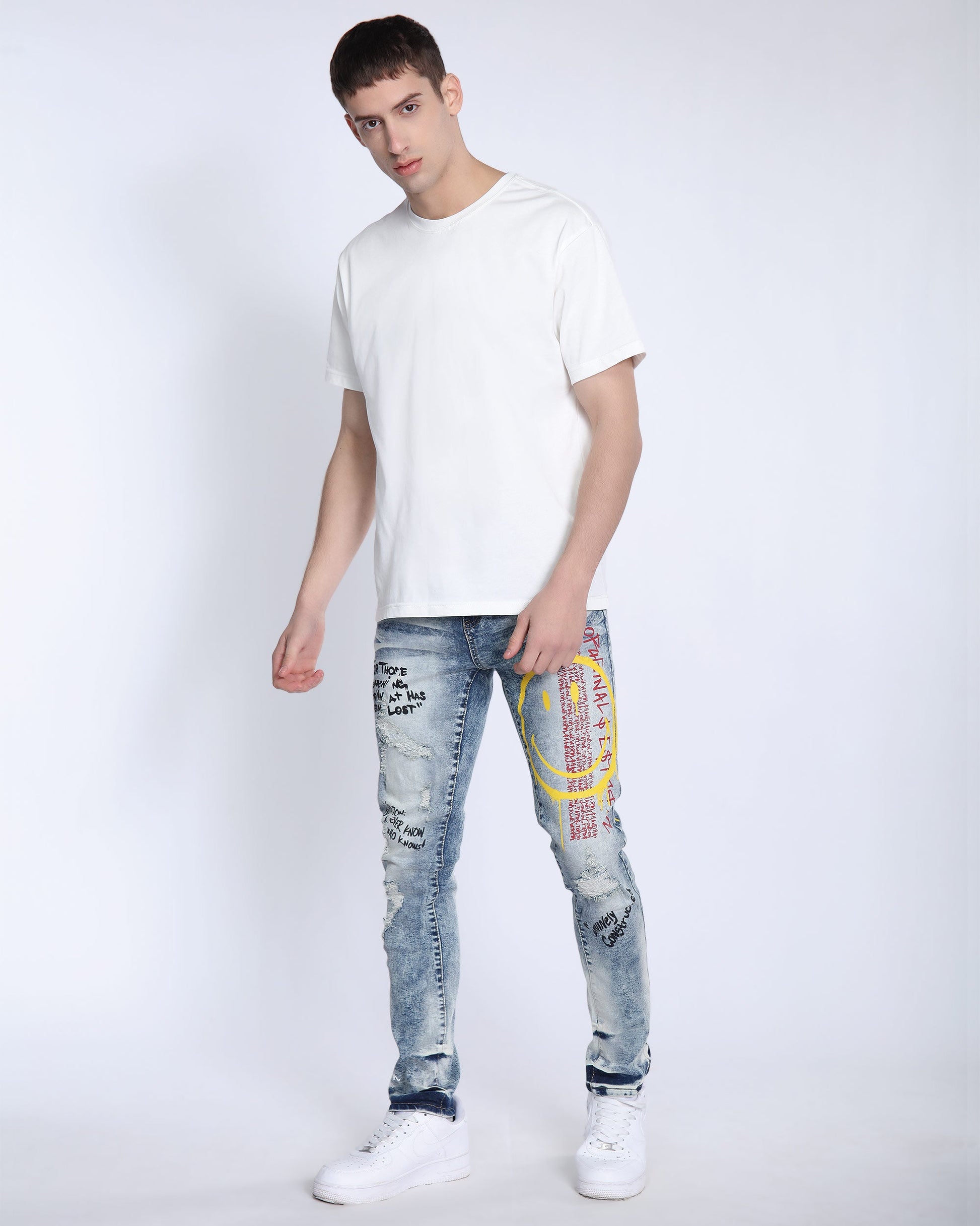 Logeqi light wash ripped jeans with unique graphic design and slim fit style