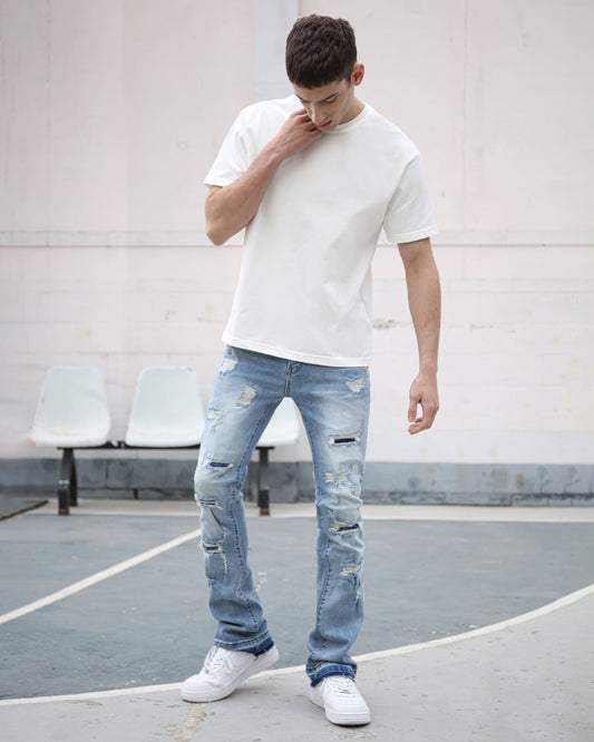 Logeqi light wash ripped jeans featuring a slim fit and distressed detailing for a stylish casual look