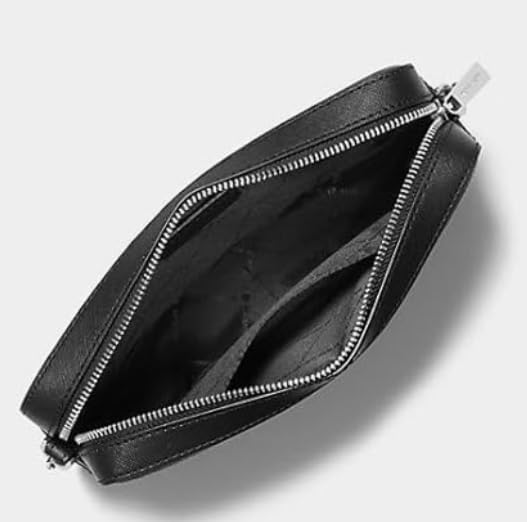 Inside view of the Michael Kors vanilla crossbody bag showing spacious compartments and sleek design